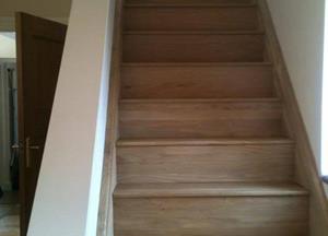 Stairs covered in solid oak
